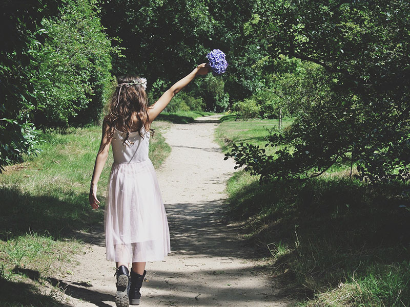 A woman having fun at a wedding.