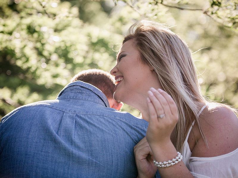 A laughing couple that shows all the signs of a good relationship.