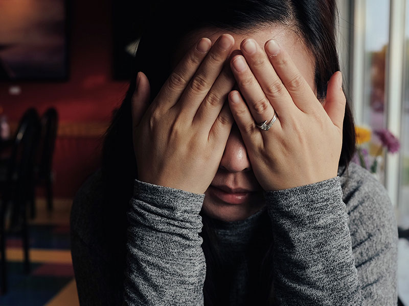 A woman wondering if she should stay with a cheating spouse.