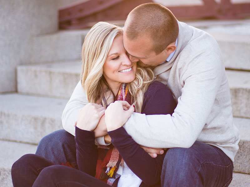 Two people who met online dating, discussing college and cuddling.