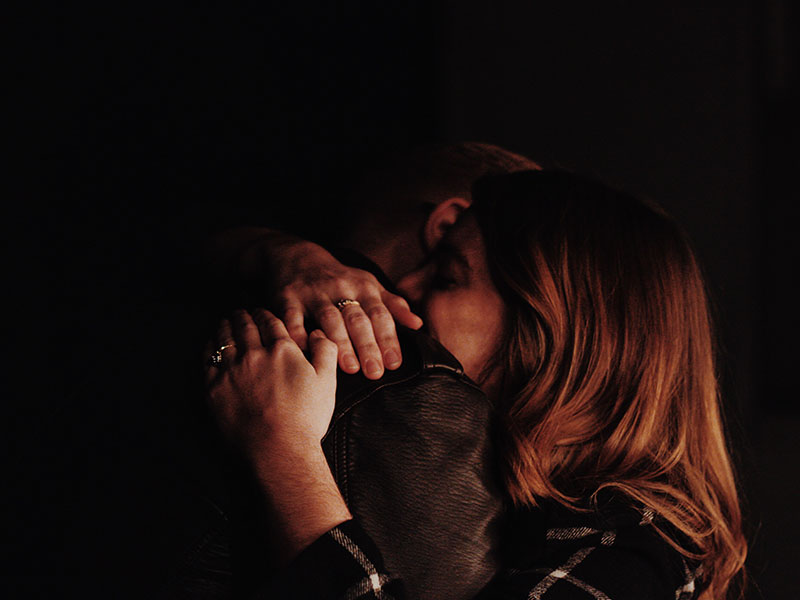 A woman hugging a man after they agree to go on a relationship break.