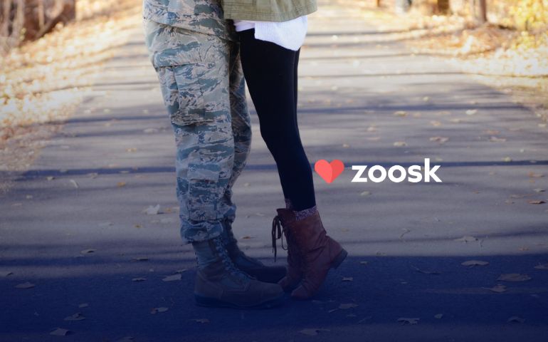 Military service man hugging his girlfriend who met on a military dating app