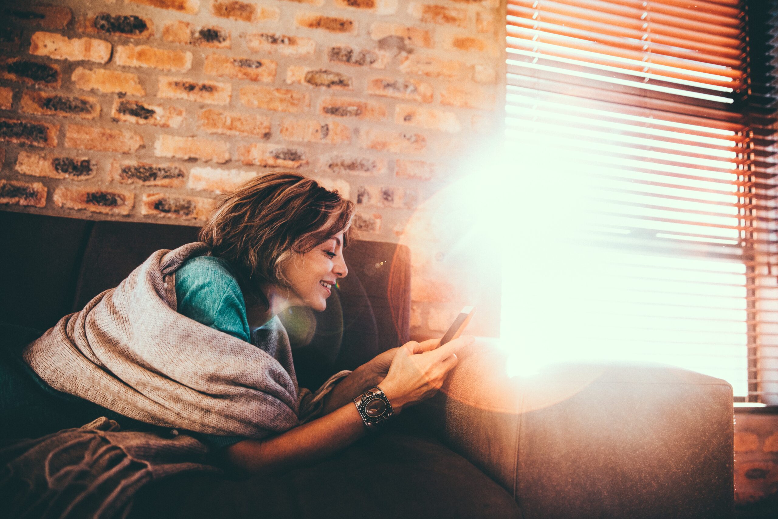 over 40s single woman using mobile on safe online dating