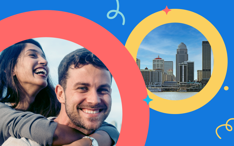 Happy, smiling couple laughing together and embracing each other while dating in Louisville.