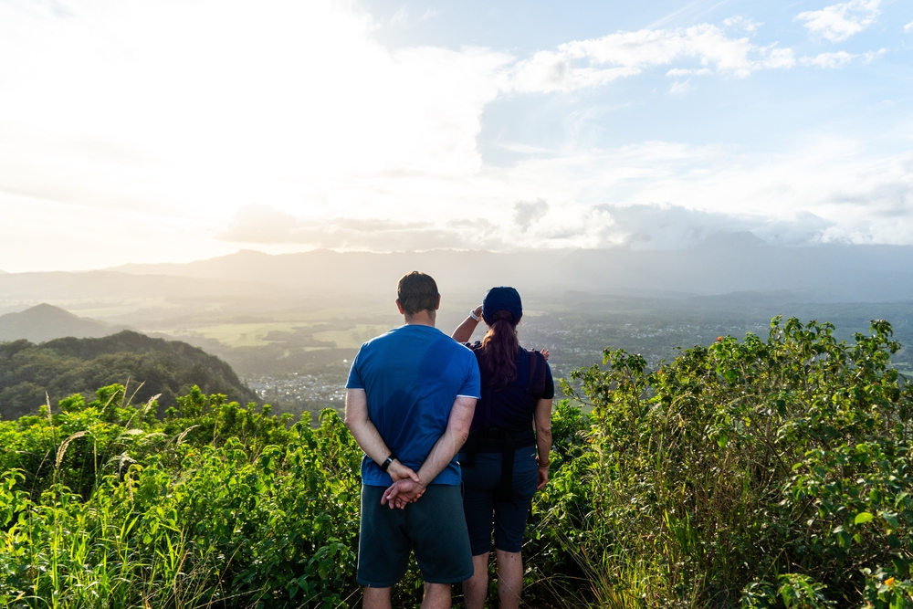 Man and woman enjoying a view during a hike in Arlington, TX.