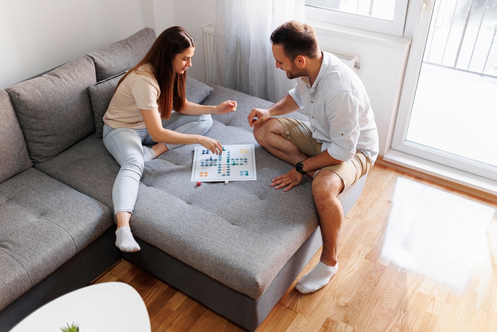 Couple playing a game together.